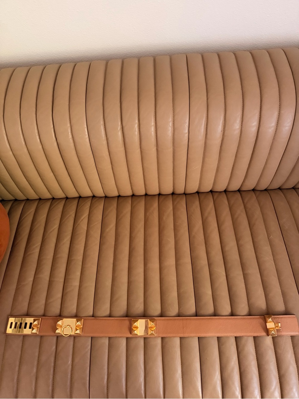 Tan Hermes belt with gold hardware